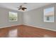 Spacious bedroom showcasing laminate floors, and large windows that bring in a lot of natural light at 3304 Bennington Ct, Winter Park, FL 32792