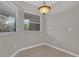 Cozy breakfast nook with tile floors, natural light, and decorative chandelier at 3304 Bennington Ct, Winter Park, FL 32792