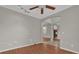 Spacious living room featuring hardwood floors, neutral paint, and an open layout at 3304 Bennington Ct, Winter Park, FL 32792