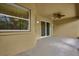 Covered patio featuring tiled floors and serene views, great for outdoor relaxation at 3304 Bennington Ct, Winter Park, FL 32792