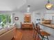 Inviting dining area featuring brick floors and a large window with natural light at 3518 Edlingham Ct, Belle Isle, FL 32812