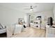 Bright bedroom with window, desk, and simple decor, creating a comfortable, quiet space at 455 Orange Ave, St Cloud, FL 34769