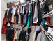 Walk-in closet featuring ample storage space and organized shelving at 455 Orange Ave, St Cloud, FL 34769