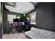 Modern studio with unique cloud ceiling, stylish decor, and natural lighting at 455 Orange Ave, St Cloud, FL 34769