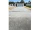 Charming single-Gathering home with a well-manicured lawn and a newly-paved driveway at 506 St Johns Ct, Poinciana, FL 34759