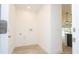 Bright laundry area with utility connections, offering a clean and functional space at 506 St Johns Ct, Poinciana, FL 34759