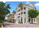 Exterior shot of a commercial building with detailed architecture, street view, and palm trees at 5303 Brady Ln, Orlando, FL 32814