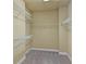 Walk-in closet offers ample storage with carpeted floor and built-in wire shelving at 5303 Brady Ln, Orlando, FL 32814