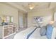 Spacious main bedroom with tray ceiling, neutral color scheme, and ample natural light at 5303 Brady Ln, Orlando, FL 32814