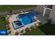 Stunning custom pool design with spa and patio area surrounded by landscaping at 5303 Brady Ln, Orlando, FL 32814