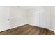 Cozy bedroom featuring wood-look floors and a closet with sliding doors at 554 Queensbridge Dr, Lake Mary, FL 32746