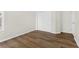 Simple bedroom with hardwood floors and a sliding door closet at 554 Queensbridge Dr, Lake Mary, FL 32746
