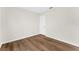 Neutral bedroom with wood flooring and door at 554 Queensbridge Dr, Lake Mary, FL 32746