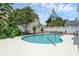 Landscaped pool area with fence at 554 Queensbridge Dr, Lake Mary, FL 32746