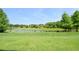 Beautiful backyard with a serene pond view, offering a tranquil and scenic outdoor space at 5908 Paxton Ct, Apopka, FL 32703
