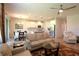 Open concept kitchen and dining area next to a cozy living room at 5908 Paxton Ct, Apopka, FL 32703