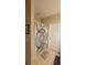 Cozy bathroom featuring decorative shower curtain and neutral tones at 6316 Raleigh St # 401, Orlando, FL 32835