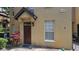 Inviting townhouse featuring a well-maintained exterior and a private entrance at 6316 Raleigh St # 401, Orlando, FL 32835