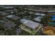 Aerial view of condos surrounded by trees and parking at 648 Kenwick Cir # 102, Casselberry, FL 32707