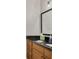Bathroom featuring cabinets and dark countertop at 648 Kenwick Cir # 102, Casselberry, FL 32707
