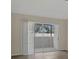 Bright room featuring sliding glass doors leading to the outdoor patio area at 648 Kenwick Cir # 102, Casselberry, FL 32707