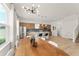 Spacious open concept with an elegant dining area and kitchen with stainless steel appliances at 701 Dennis Ave, Orlando, FL 32807