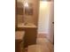 Bathroom features a tiled floor, a vanity with mirror, a sink, and a toilet at 706 Lighthouse Ct, Altamonte Springs, FL 32714