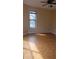 Bedroom with wood flooring, a window, and a ceiling fan with light fixture at 706 Lighthouse Ct, Altamonte Springs, FL 32714