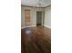 Bedroom featuring wood floors, a ceiling fan, a closet and a window with blinds at 706 Lighthouse Ct, Altamonte Springs, FL 32714