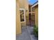 Exterior image of courtyard with brick pavers and black iron gate for added privacy at 706 Lighthouse Ct, Altamonte Springs, FL 32714