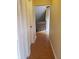 View of second story hallway with wood flooring and stair access at 706 Lighthouse Ct, Altamonte Springs, FL 32714