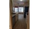 Bright and functional kitchen with tiled floors and window views at 706 Lighthouse Ct, Altamonte Springs, FL 32714