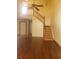 Living room view showcasing hardwood floors, staircase and a high ceiling at 706 Lighthouse Ct, Altamonte Springs, FL 32714