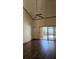 Bright living room with hardwood floors and sliding glass door at 706 Lighthouse Ct, Altamonte Springs, FL 32714