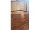 Bright living room with wood floors and a neutral color palette creates a cozy, inviting space at 706 Lighthouse Ct, Altamonte Springs, FL 32714