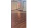 Inviting living room featuring wood-look flooring, neutral walls, and natural light at 706 Lighthouse Ct, Altamonte Springs, FL 32714