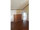 Upstairs living room featuring wood floors, a ceiling fan and vertical blinds at 706 Lighthouse Ct, Altamonte Springs, FL 32714