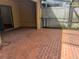 Enclosed patio with red brick flooring and covered enclosure at 706 Lighthouse Ct, Altamonte Springs, FL 32714