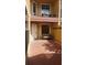 Cozy patio with brick flooring, a white entrance door and comfortable seating at 706 Lighthouse Ct, Altamonte Springs, FL 32714