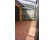 Enclosed patio with red brick flooring and screen enclosure at 706 Lighthouse Ct, Altamonte Springs, FL 32714
