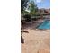 Inviting community pool with lounge chairs on a sunny day at 706 Lighthouse Ct, Altamonte Springs, FL 32714