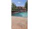 Community pool with ample seating and lounge chairs for residents at 706 Lighthouse Ct, Altamonte Springs, FL 32714
