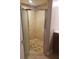 Tiled shower with glass doors and tiled floor at 706 Lighthouse Ct, Altamonte Springs, FL 32714
