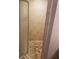 Tiled shower with glass doors and tiled floor at 706 Lighthouse Ct, Altamonte Springs, FL 32714