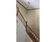 Interior image of a staircase featuring light walls, dark trim and banister, and a light fixture at 706 Lighthouse Ct, Altamonte Springs, FL 32714