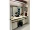 Bathroom with double sinks and vanity for storage to keep items organized at 707 Carpenters Way # 50, Lakeland, FL 33809