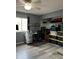 Bedroom with a window, and a desk, and stacked storage bins and boxes at 707 Carpenters Way # 50, Lakeland, FL 33809