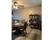 Dining room featuring a glass table with seating and decorative shelving at 707 Carpenters Way # 50, Lakeland, FL 33809