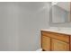 Bathroom featuring a single sink vanity with wood cabinets and a white countertop at 809 Deer Glen Ct, Fruitland Park, FL 34731