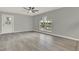 The open living room leads to the back yard at 809 Deer Glen Ct, Fruitland Park, FL 34731